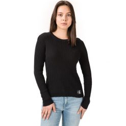 Calvin Klein Sweter Czarny. Czarne bluzy damskie Calvin Klein, l, bez wzorów, z bawełny, bez rękawów, bez kaptura. Za 393,95 zł.