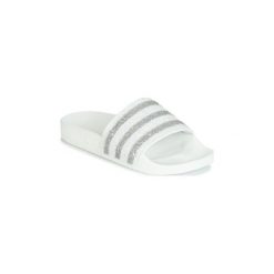 Klapki adidas ADILETTE W. Białe klapki damskie Adidas, bez wzorów, bez obcasa. Za 219,00 zł.