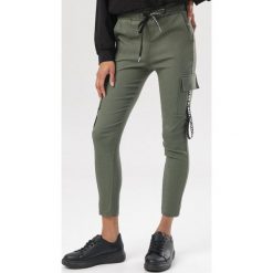 Khaki Spodnie Delomare. Brązowe spodnie damskie Born2be, s. Za 129,99 zł.