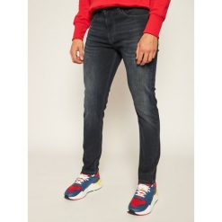 Jeansy Skinny Fit Tommy Jeans Simon DM0DM08265. Niebieskie jeansy męskie Tommy Jeans, m, bez wzorów. Za 449,00 zł.