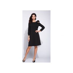 Elegancka sukienka pudełkowa z wcięciem w rękawie. Czarne sukienki damskie marki Bien fashion, s, bez wzorów, eleganckie, bez kołnierzyka, z długim rękawem, długie, midi, trapezowe. Za 169,00 zł.
