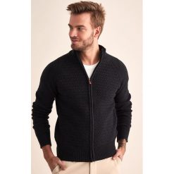 Sweter w kolorze antracytowym. Szare swetry męskie TATUUM, s, bez wzorów, z wełny, ze stójką, bez kaptura. W wyprzedaży za 189,95 zł.