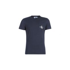 T-shirty z krótkim rękawem Calvin Klein Jeans MONOGRAM POCKET SLIM TEE. Niebieskie t-shirty męskie marki Calvin Klein Jeans, s, bez wzorów, z jeansu, bez kołnierzyka, krótkie. Za 129,00 zł.