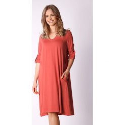 Sukienka w kolorze pomarańczowym. Pomarańczowe sukienki damskie Moda na kolor, xs, bez wzorów, bez kołnierzyka, bez rękawów, midi. W wyprzedaży za 169,95 zł.