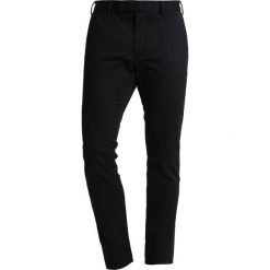 Spodnie męskie: Polo Ralph Lauren FLAT PANT Spodnie materiałowe polo black