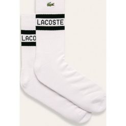 Lacoste - Skarpetki. Białe skarpetki męskie Lacoste, z aplikacjami, z elastanu. W wyprzedaży za 69,90 zł.