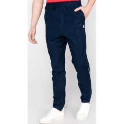 Tommy Hilfiger Spodnie Niebieski. Niebieskie spodnie męskie TOMMY HILFIGER, l, bez wzorów, z elastanu. Za 602,95 zł.