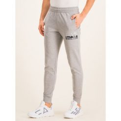 Spodnie dresowe EA7 Emporio Armani 6GPP53 PJ05Z 3905. Szare jeansy męskie EA7 Emporio Armani, xxl, bez wzorów. W wyprzedaży za 299,00 zł.