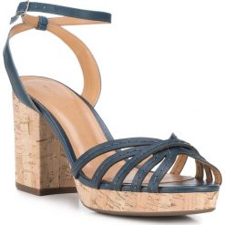 Buty damskie. Niebieskie klapki damskie Wittchen, w paski, ze skóry, bez obcasa, na słupku. W wyprzedaży za 259,90 zł.