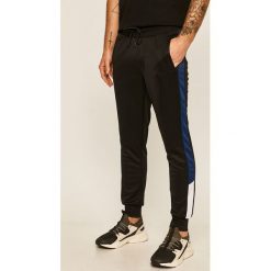 Produkt by Jack & Jones - Spodnie. Czarne spodnie męskie PRODUKT by Jack & Jones, xl, z aplikacjami, z poliesteru. Za 129,90 zł.