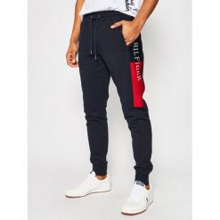 Spodnie dresowe TOMMY HILFIGER Intersia MW0MW13732. Niebieskie jeansy męskie TOMMY HILFIGER, s, bez wzorów. W wyprzedaży za 479,00 zł.
