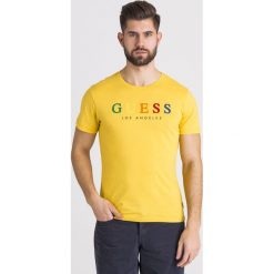 T-SHIRT COLORFUL GUESS. Żółte t-shirty męskie Guess, s, z nadrukiem, z bawełny, z okrągłym kołnierzem. Za 85,00 zł.