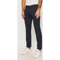 Hugo - Spodnie. Czarne spodnie męskie HUGO, na co dzień, bez wzorów, z elastanu. Za 429,90 zł.
