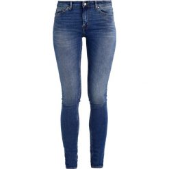 Tiger of Sweden Jeans SLIGHT Jeans Skinny Fit medium blue. Niebieskie jeansy damskie skinny marki Tiger of Sweden Jeans, z elastanu. Za 579,00 zł.
