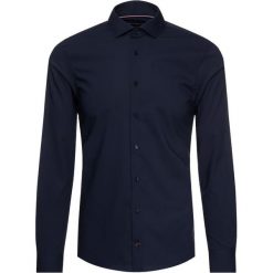 Koszula Tommy Hilfiger Tailored Core Stretch TT0TT01936. Niebieskie koszule męskie Tommy Hilfiger Tailored, m, bez wzorów, z elastanu, biznesowe, bez kołnierzyka, bez rękawów. W wyprzedaży za 209,00 zł.