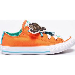 Converse - Tenisówki dziecięce. Pomarańczowe trampki dziewczęce Converse, bez wzorów, z materiału, na sznurówki. W wyprzedaży za 129,90 zł.