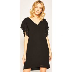 Sukienka koktajlowa DKNY P0ABGESS. Czarne sukienki damskie DKNY, m, bez wzorów, z poliesteru, wizytowe, bez kołnierzyka, bez rękawów. Za 589,00 zł.