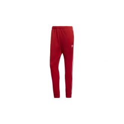 Spodnie treningowe adidas Spodnie dresowe SST. Czerwone spodnie dresowe męskie marki Adidas, z dresówki. Za 279,00 zł.