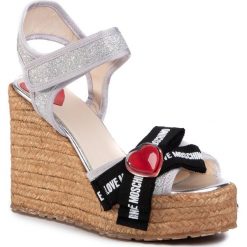 Espadryle LOVE MOSCHINO - JA1609BI0AJJ0902 Argento. Szare espadryle damskie Love Moschino, bez wzorów, ze skóry, bez obcasa, na obcasie. W wyprzedaży za 989,00 zł.
