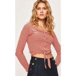 Pepe Jeans - Longsleeve FALBALA. Czarne bluzki damskie Pepe Jeans, s, bez wzorów, z elastanu, casualowe, z okrągłym kołnierzem. W wyprzedaży za 139,90 zł.