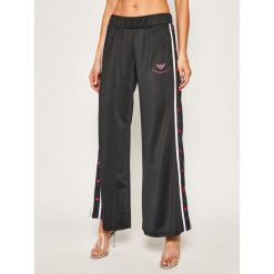 Spodnie dresowe EA7 Emporio Armani 3HTP81 TJ26Z 1200. Czarne spodnie damskie EA7 Emporio Armani, xs, z poliesteru. Za 489,00 zł.