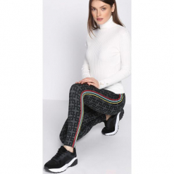 Szaro-Żółte Legginsy Particular Taste. Żółte legginsy marki Mohito, l, z dzianiny. Za 39,99 zł.