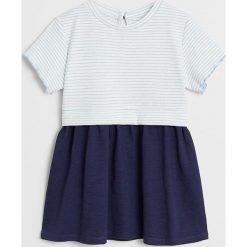 Mango Kids - Sukienka dziecięca Alba 80-104 cm. Różowe sukienki dziewczęce Mango Kids, bez wzorów, z elastanu, z krótkim rękawem, krótkie, mini, rozkloszowane. Za 59,90 zł.
