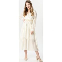 Kremowa Sukienka Stacy. Brązowe sukienki damskie Born2be, na co dzień, s, w paski, bez kołnierzyka, z długim rękawem, długie, mini, rozkloszowane. Za 129,99 zł.