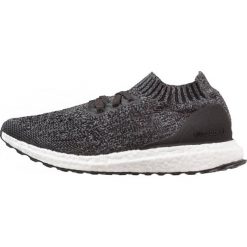 Adidas Performance ULTRABOOST UNCAGED Obuwie do biegania treningowe core black/solid grey/grey three. Czarne buty damskie do biegania adidas Performance, z tworzywa sztucznego. W wyprzedaży za 339,50 zł.