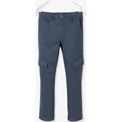 Spodnie w kolorze niebieskim. Niebieskie spodnie niemowlęce Vertbaudet Boys & Co., w paski. W wyprzedaży za 32,95 zł.