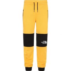 Spodnie dresowe The North Face Himalayan T93OD5LR0. Żółte spodnie męskie The North Face, m, bez wzorów, z dresówki. Za 194,99 zł.
