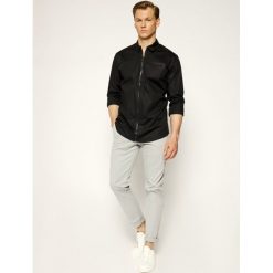 Koszula Karl Lagerfeld 605906 501600. Czarne koszule męskie KARL LAGERFELD, xl, bez wzorów, z elastanu, casualowe, bez kołnierzyka, bez rękawów. W wyprzedaży za 649,00 zł.