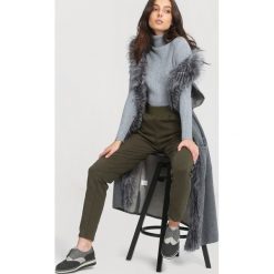 Ciemnozielone Spodnie Dresowe Fireflies. Zielone spodnie dresowe damskie other, xl, z dresówki. Za 59,99 zł.