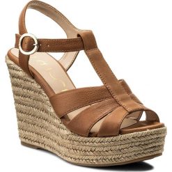 Espadryle UNISA - Mueca Cuero Softy S. Brązowe espadryle damskie marki Unisa, ze skóry, na obcasie. W wyprzedaży za 289,00 zł.