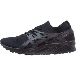 Asics Tiger GEL KAYANO TRAINER KNIT Tenisówki i Trampki black. Czarne tenisówki damskie Asics Tiger, z tworzywa sztucznego. W wyprzedaży za 382,85 zł.