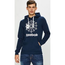 Reebok Classic - Bluza. Niebieskie bluzy męskie Reebok Classic, s, z nadrukiem, z elastanu, z kapturem, bez rękawów, z kapturem. W wyprzedaży za 199,90 zł.