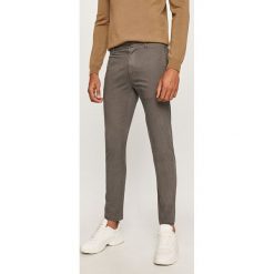 Hugo - Spodnie. Spodnie męskie HUGO, bez wzorów, z elastanu. Za 429,90 zł.