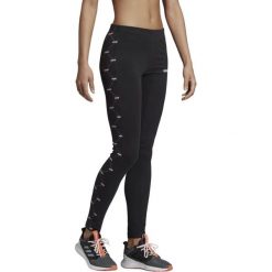 Legginsy adidas Linear Graphic czarne EI6270. Czarne spodnie damskie Adidas, s, z nadrukiem, z bawełny. Za 139,00 zł.