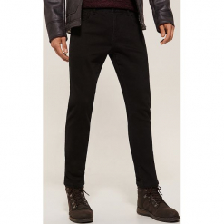 Ocieplane spodnie slim fit - Czarny. Czarne spodnie męskie marki House, s, bez wzorów. W wyprzedaży za 39,99 zł.