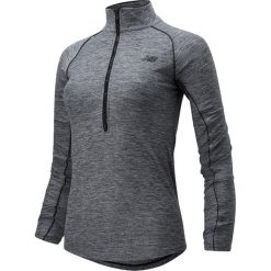 NEW BALANCE > WT01137BKH. Pomarańczowe bluzy damskie New Balance, xl, bez wzorów, z poliesteru, bez rękawów, długie, bez kaptura. Za 299,99 zł.