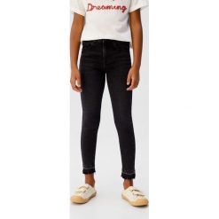 Mango Kids - Jeansy dziecięce Lora 110-164 cm. Niebieskie jeansy dziewczęce Mango Kids, bez wzorów, z elastanu. Za 89,90 zł.