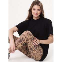 Jasnobrązowe Legginsy Total Look. Pomarańczowe legginsy damskie Born2be, s, bez wzorów, z dzianiny, klasyczne. Za 49,99 zł.