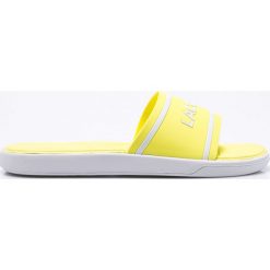 Lacoste - Klapki. Żółte klapki damskie marki Lacoste, z materiału, na płaskiej podeszwie. W wyprzedaży za 159,90 zł.