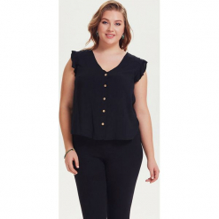 Bluzka w kolorze czarnym. Czarne bralety marki Los Banditos. W wyprzedaży za 129,95 zł.