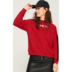 Bluza z lampasami - Czerwony. Czerwone bluzy damskie Sinsay, l. Za 39,99 zł.