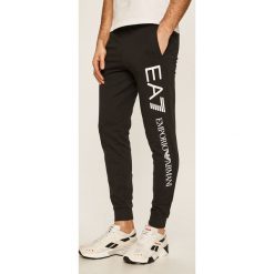 EA7 Emporio Armani - Spodnie. Niebieskie spodnie męskie EA7 Emporio Armani, na co dzień, s, z nadrukiem, z bawełny. Za 429,90 zł.