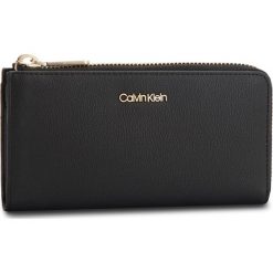 Duży Portfel Damski CALVIN KLEIN - Drive Large Zip Arou K60K604503 001. Czarne portfele damskie marki Calvin Klein, ze skóry ekologicznej. Za 299,00 zł.