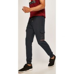 Tommy Hilfiger - Spodnie. Niebieskie spodnie męskie TOMMY HILFIGER, na co dzień, s, bez wzorów, z bawełny, casualowe. Za 549,90 zł.