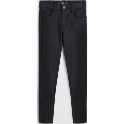 Mango Kids - Spodnie dziecięce Coated 110-164 cm. Szare spodnie dziewczęce Mango Kids, bez wzorów, z elastanu, casualowe. Za 89,90 zł.