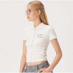 Koszulka polo z napisem - Kremowy. Białe koszulki damskie Sinsay, xl, z napisami, polo, bez rękawów. W wyprzedaży za 14,99 zł.